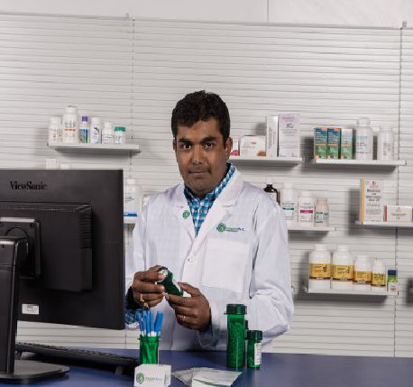 pharmacist holding medicine
